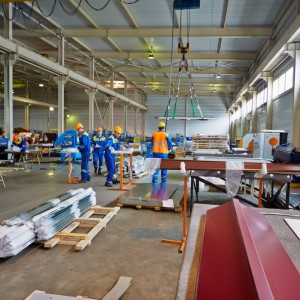 LOBNYA - JUN 7: Workers in manufacturing workshop at plant of Gr